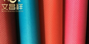 The difference between polyester Oxford cloth medium filament yarn and low elastic yarn textile
