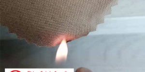What is the basic principle of flame retardant fabrics?