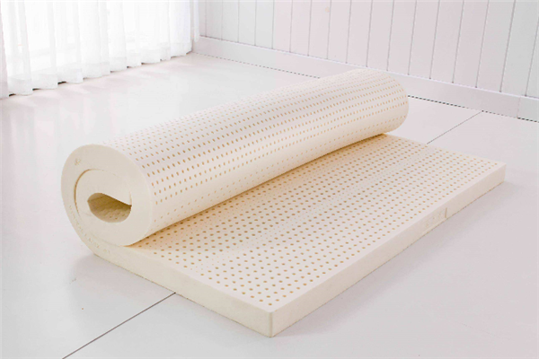 What causes latex mattresses to turn yellow