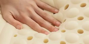 What should I do if my latex mattress smells